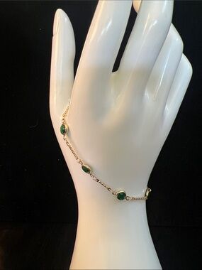 Gold-Tone Bracelet with Green Gem Accents